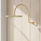 Unlacquered solid brass gooseneck shower arm with round rainfall showerhead for a luxurious bathroom finish