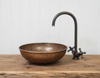 Handmade Hammered Copper Vessel Sink with Aged Bronze Faucet for Rustic Luxury Bathroom Designs