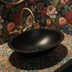 Handmade Hammered Oval Vessel Sink Solid Copper Basin with Matte Black Finish for Elegant Luxury Interiors