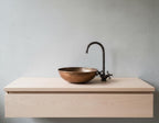 Handmade Hammered Copper Vessel Sink with Aged Bronze Faucet for Rustic Luxury Bathroom Designs
