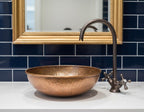 Handmade Hammered Copper Vessel Sink with Aged Bronze Faucet for Rustic Luxury Bathroom Designs
