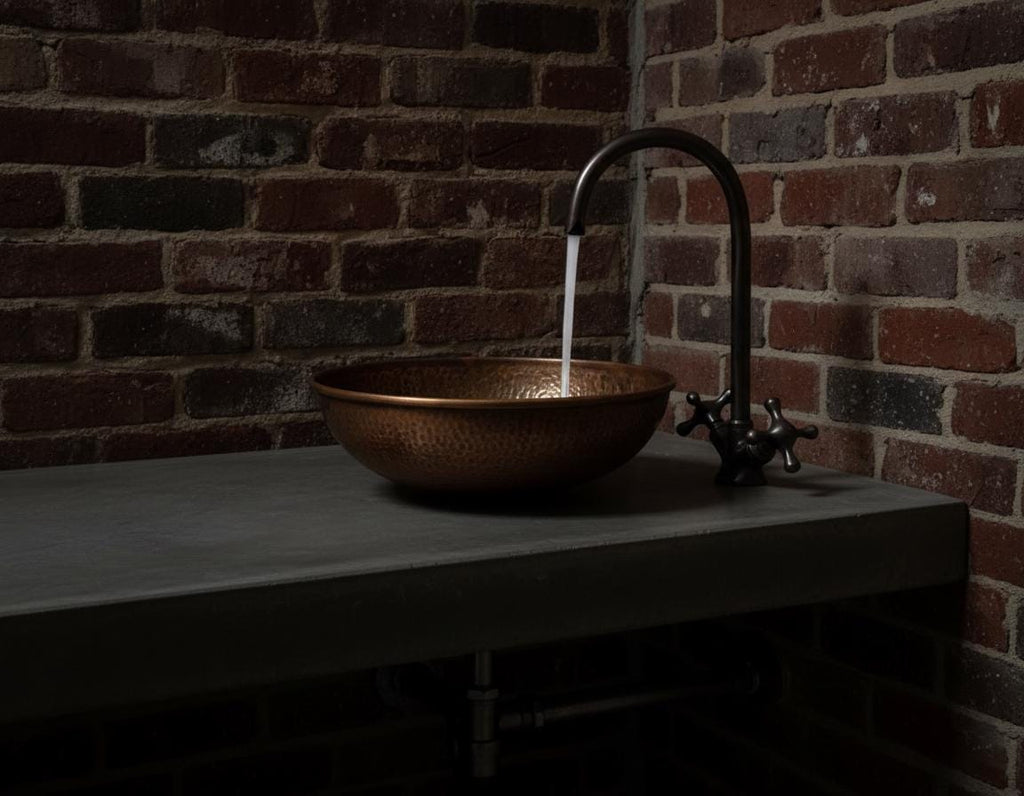 Handmade Hammered Copper Vessel Sink with Aged Bronze Faucet for Rustic Luxury Bathroom Designs