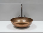 Handmade Hammered Copper Vessel Sink with Aged Bronze Faucet for Rustic Luxury Bathroom Designs